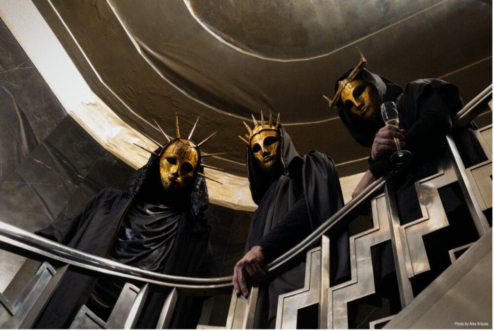 Ein Bandbild von Imperial Triumphant auf einer Treppe